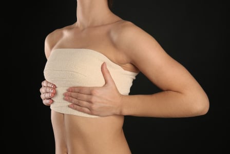 Wear compression bra after breast augmentation